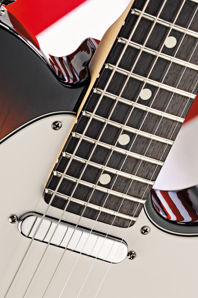 blank 22 medium jumbo frets lend modern feel and playability to the Fender workhorse